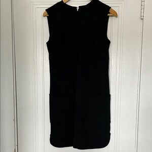 Elegant Black Sleeveless Mini Dress by Kimmie kakes.